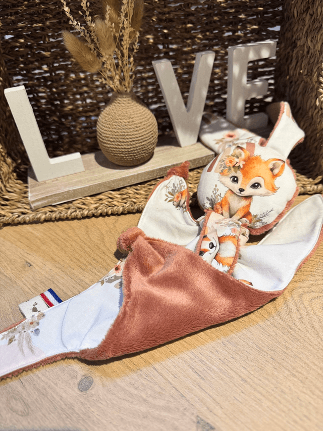 Doudou renard arc en ciel